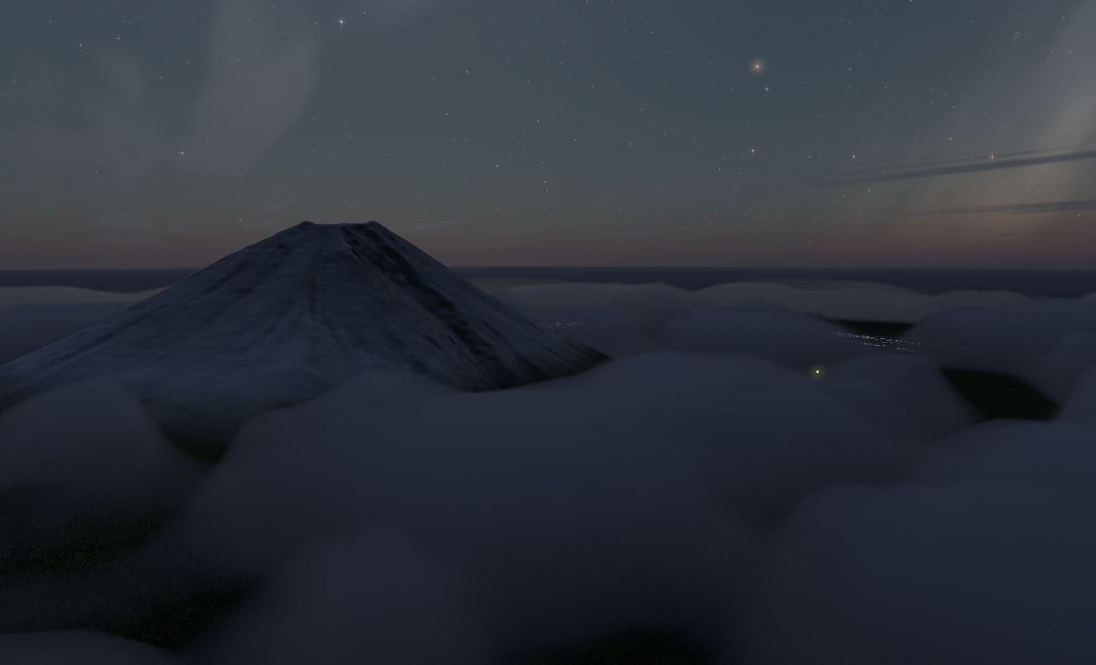 薄暮の富士山。眼下を埋め尽くす雲海の上に山頂だけが黒く突き出し、星の出た空へ稜線が伸びる